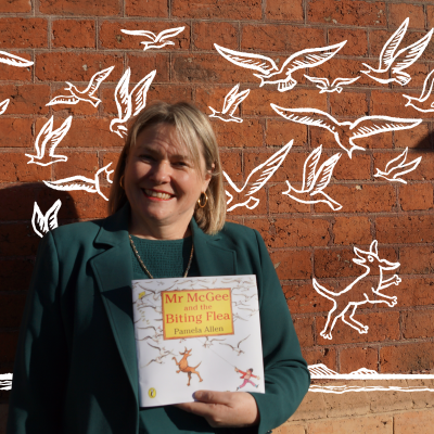 Simone Eirth with her favourite book to teach in celebration Children's Book Week of 